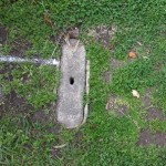 A small, old pit that might contain asbestos